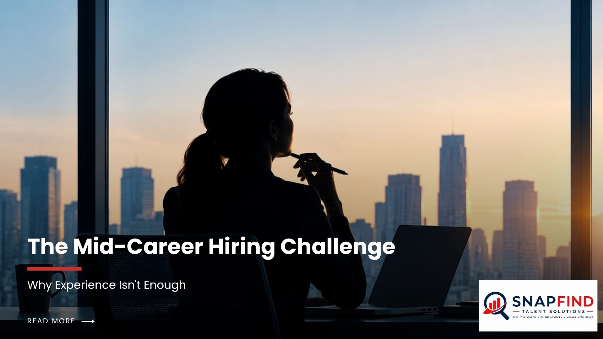 Experienced professional reviewing career documents and exploring new job opportunities at a modern office desk.